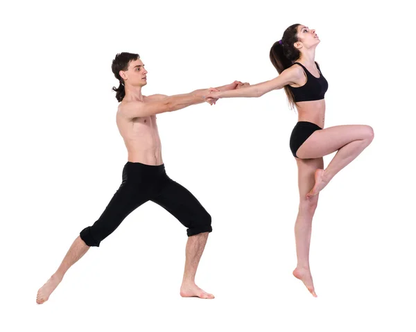 Couple man and woman exercising fitness dancing on white background — Stock Photo, Image