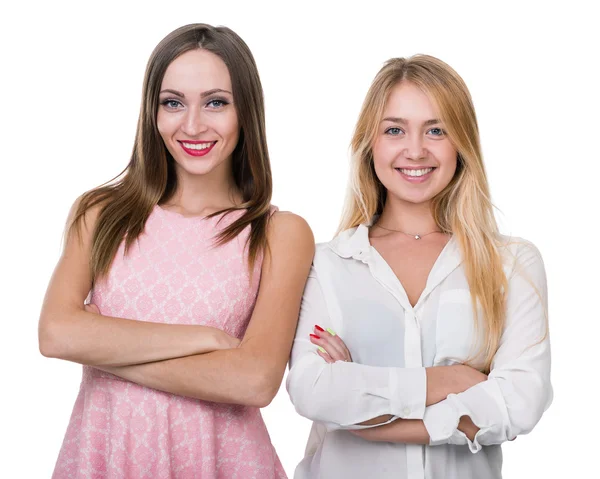 Дві молоді усміхнені жінки, ізольовані над білим — стокове фото
