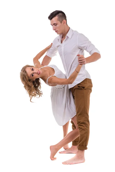 Young elegant couple dancing. Isolated on white — Stock Photo, Image