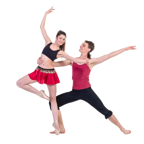 Couple man and woman exercising fitness dancing on white background — Stock Photo, Image