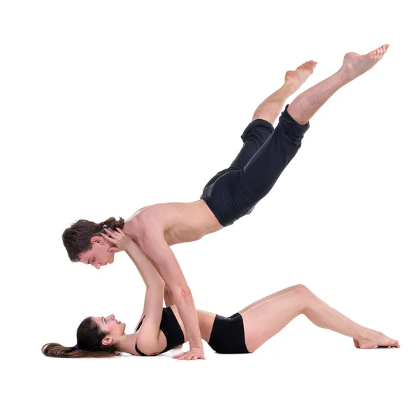 Couple man and woman exercising fitness dancing on white background — Stock Photo, Image