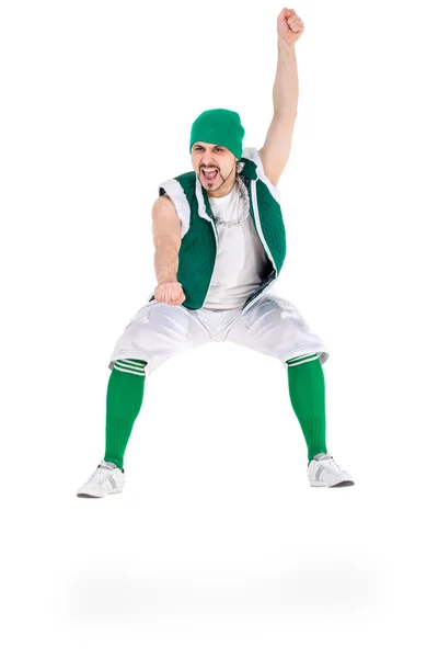 Friendly man dressed like a funny gnome jumping Isolated on white — Stock Photo, Image