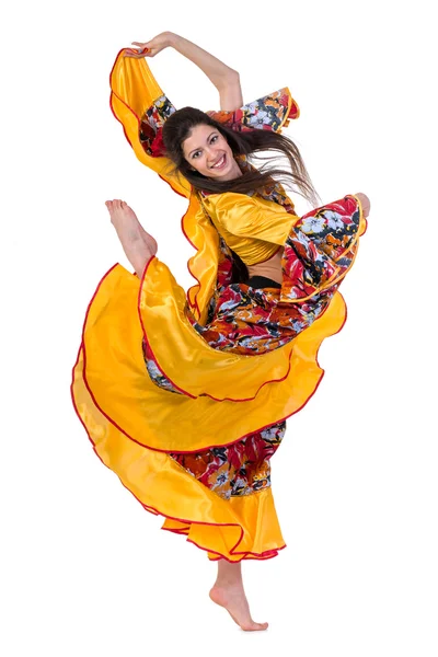 Gypsy woman jumping against isolated white background — Stock Photo, Image