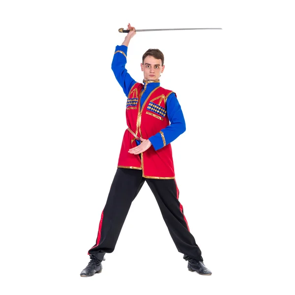 Russian cossack dance. Young dancer posing with sword — Stock Photo, Image