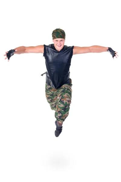 Танцюрист одягнений солдат стрибає — стокове фото