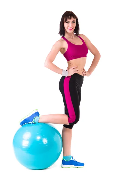 Young smiling woman makes exercise with fitball — Stock Photo, Image