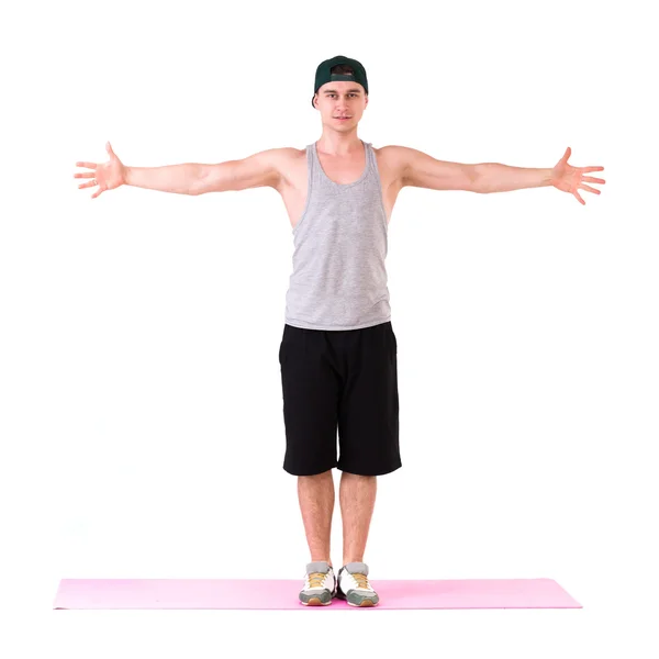 Ganzkörperporträt eines fitten jungen Mannes auf weißem Hintergrund — Stockfoto