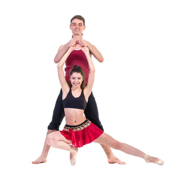 Full length of young ballet couple dancing on white background — Stock Photo, Image