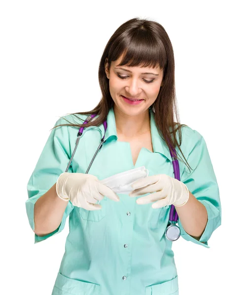 Female doctor wearing surgical mask — Stock Photo, Image