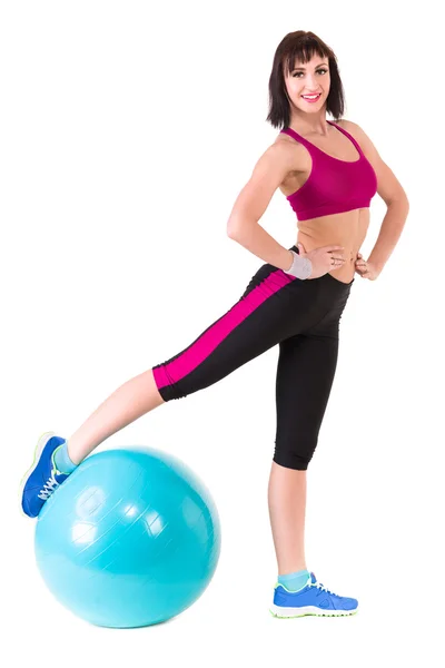 Young smiling woman makes exercise with fitball — Stock Photo, Image