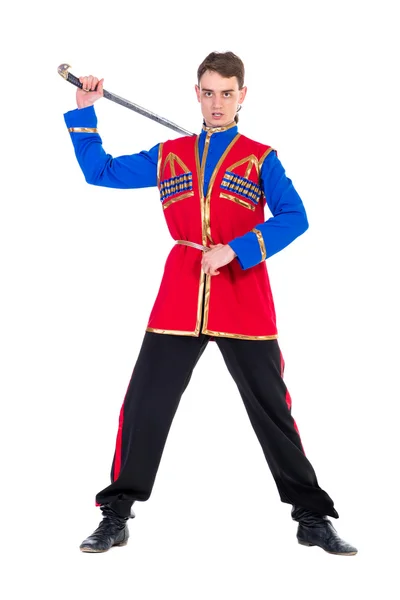 Russian cossack dance. Young dancer posing with sword — Stock Photo, Image