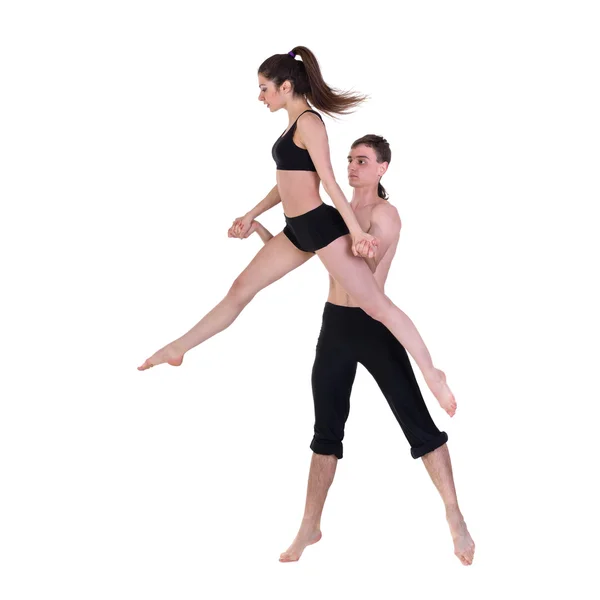 Couple man and woman exercising fitness dancing on white background — Stock Photo, Image