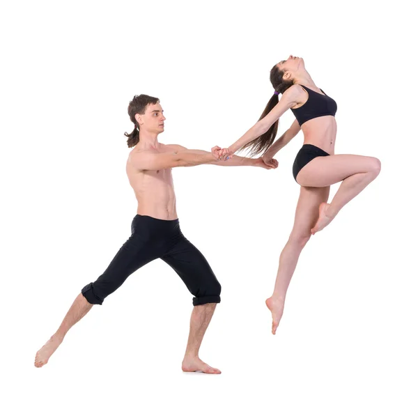 Couple man and woman exercising fitness dancing on white background — Stock Photo, Image