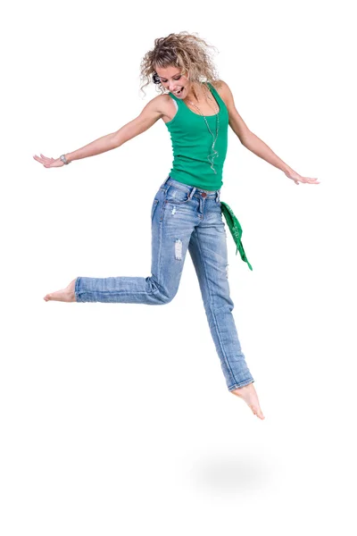 Young dancer woman jumping against white background — Stock Photo, Image