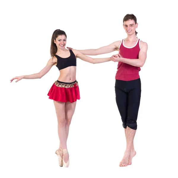 Full length of young ballet couple dancing on white background — Stock Photo, Image