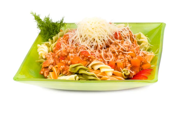 Pasta with meat, tomato sauce and vegetables on white — Stock Photo, Image