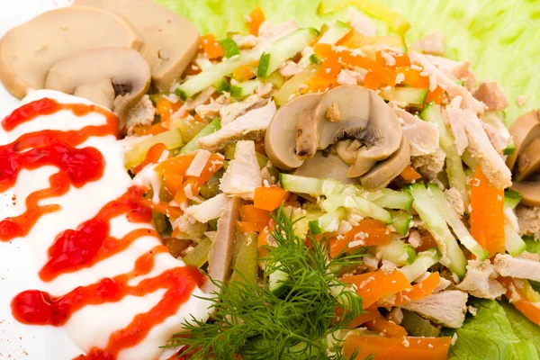 Salad with assorted greens, fried pork, carrots, croutons, parmesan cheese, and mushrooms — Stock Photo, Image