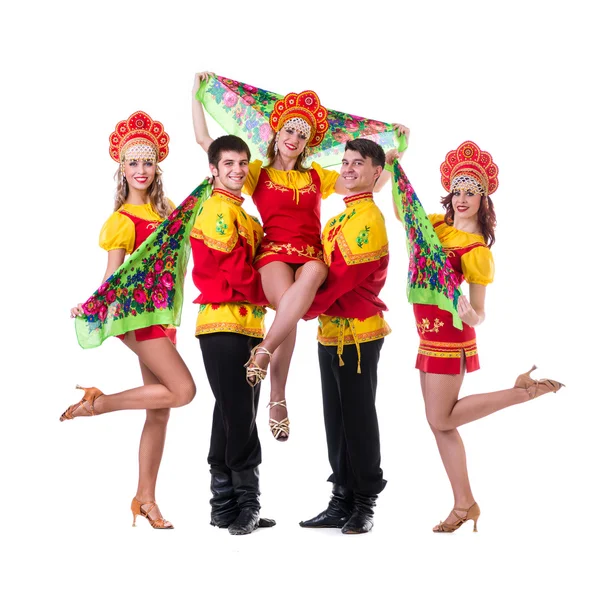 Dancer team wearing a folk costumes isolated on white — Stock Photo, Image