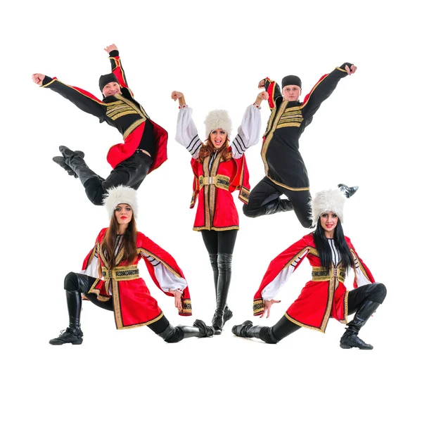 Dancer team wearing a folk Caucasian highlander costumes jumping — Stock Photo, Image