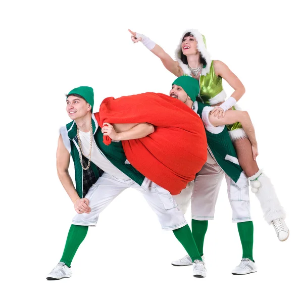 Vriendelijke mensen gekleed als een grappige kabouters dansen, geïsoleerd op wit — Stockfoto