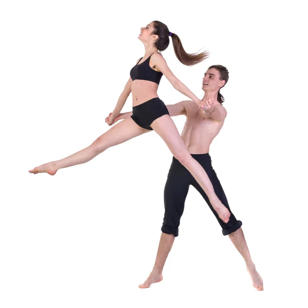 Couple man and woman exercising fitness dancing on white background — Stock Photo, Image