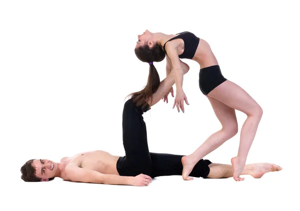 Couple man and woman exercising fitness dancing on white background — Stock Photo, Image