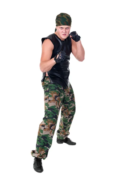 Man dressed soldier posing in front fighter isolated on white — Stock Photo, Image