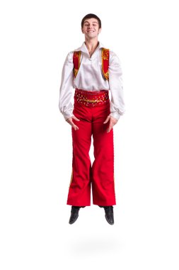 Bir Boğa güreşçisi kostüm giyen adam atlama. Tam uzunlukta beyaz izole.