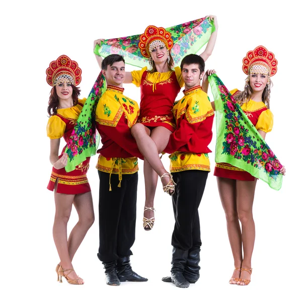 Dancer team wearing a folk costumes isolated on white — Stock Photo, Image