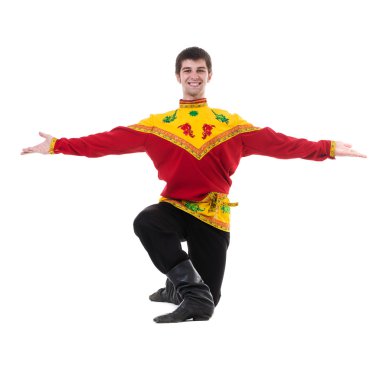 izole beyaz boşaltmak ile karşı dans halk Rus kostüm giyen genç adam