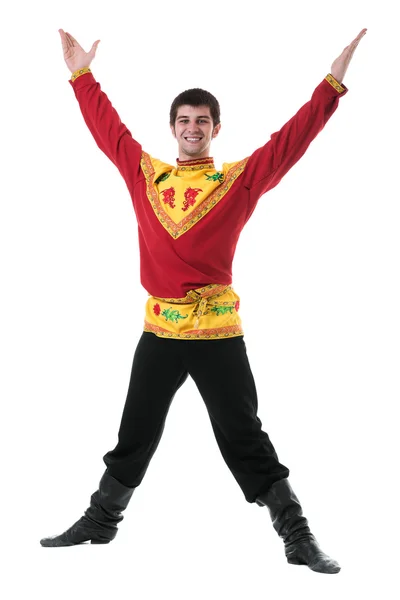 Young man wearing a folk russian costume dancing against isolated white with copyspace — Stock Photo, Image