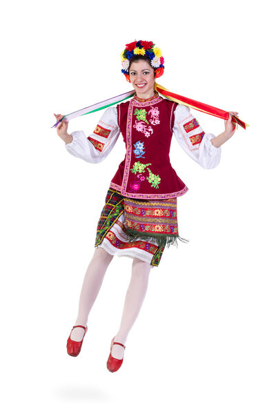 beautiful jumping girl in ukrainian polish national traditional costume clothes happy smile, full length portrait isolated
