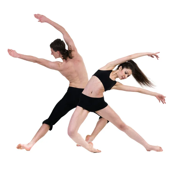 Pareja hombre y mujer ejercitando fitness bailando sobre fondo blanco — Foto de Stock