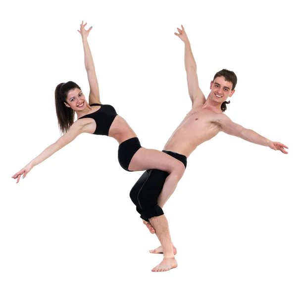 Pareja hombre y mujer ejercitando fitness bailando sobre fondo blanco — Foto de Stock