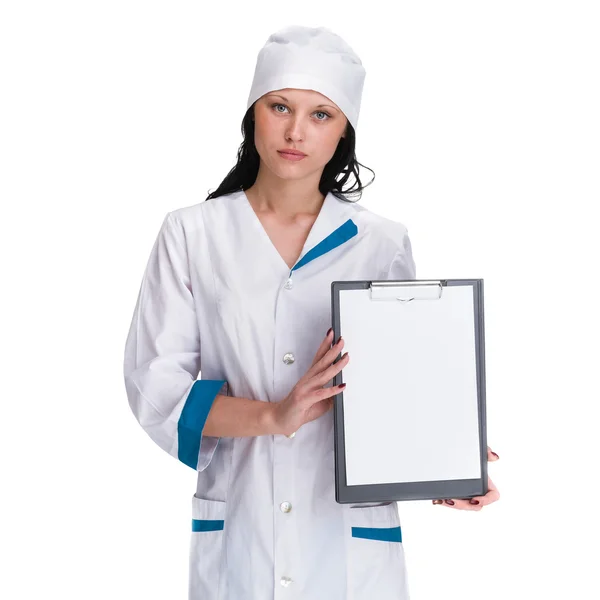 Mujer médico o enfermera mostrando vacío en blanco — Foto de Stock