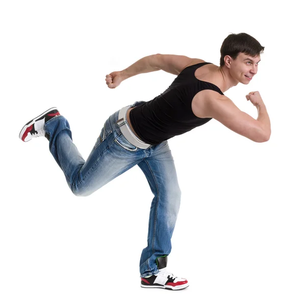Full length portrait of young man athlete doing stretches exercises isolated on white — Stock Photo, Image