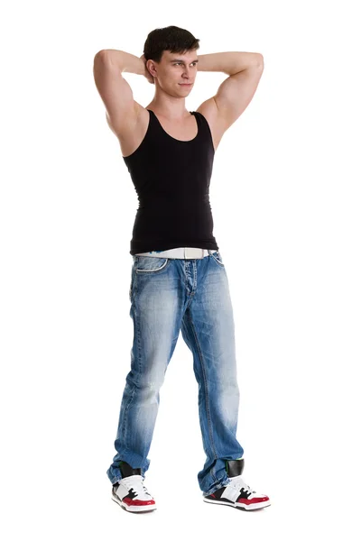 Retrato de cuerpo entero del joven atleta haciendo ejercicios de estiramientos aislados en blanco — Foto de Stock