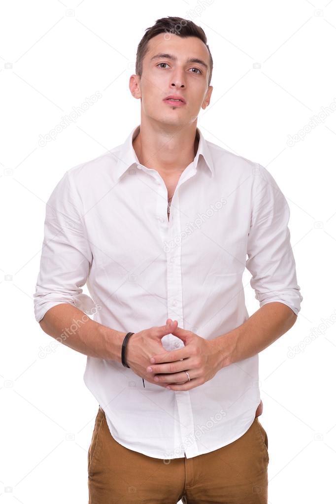 Thinking man isolated on white background. Closeup portrait of a casual young pensive businessman