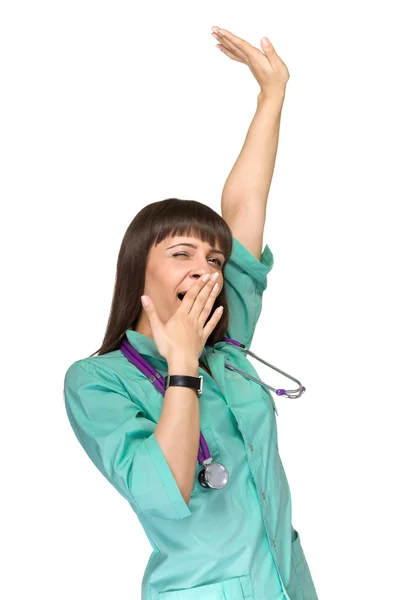 Woman doctor tired yawning — Stockfoto