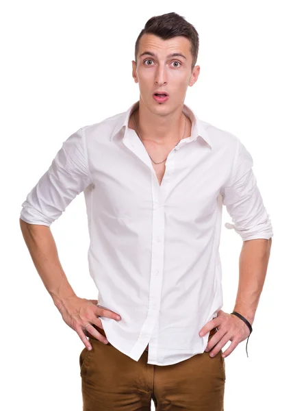 Portrait of surprised young man isolated on white — Stock Photo, Image