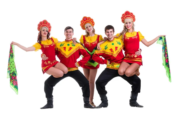 Dancer team wearing a folk costumes isolated on white — Stock Photo, Image