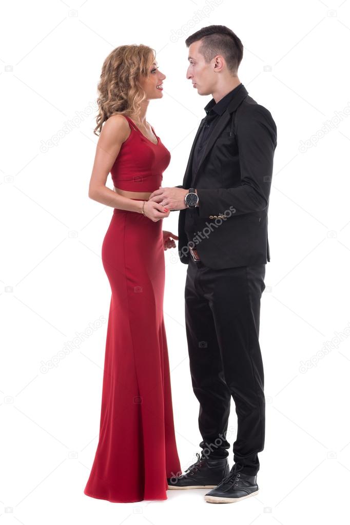 Young elegant couple dancing, isolated on white