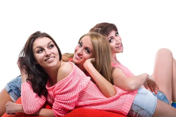 Portrait de trois jeunes femmes sexy isolées sur blanc — Photo