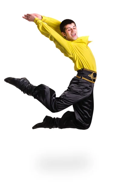 Hombre saltando usando un disfraz de toreador. Aislado en blanco en longitud completa . —  Fotos de Stock