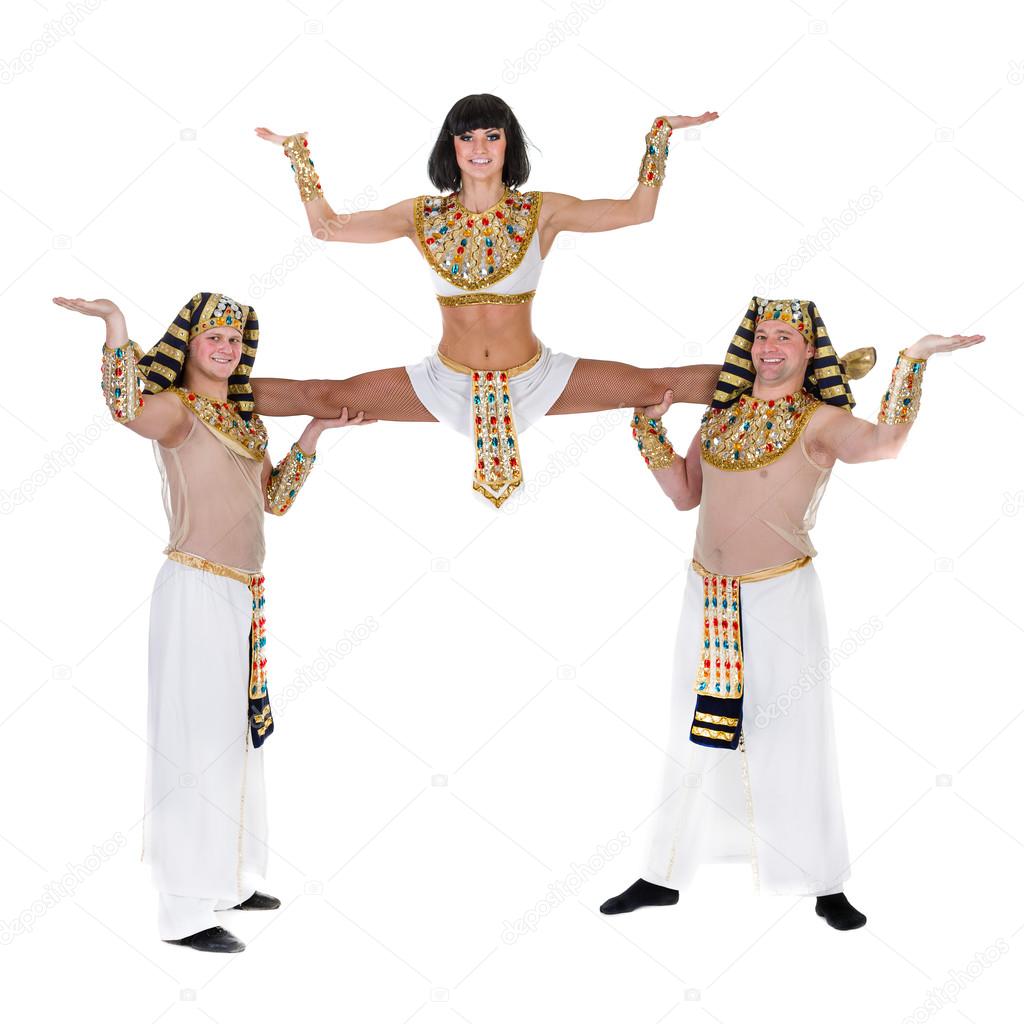 dancers dressed in Egyptian costumes posing