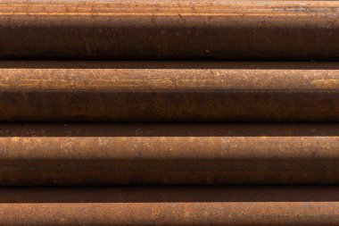 Paslı metal boruların yüzeyinin dokusu, arka plan.