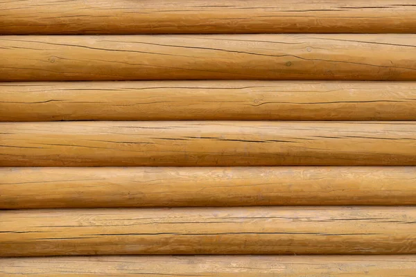 The texture of the wall of a wooden log house., background. — Stock Photo, Image