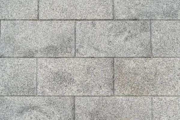 La textura de las baldosas de granito gris natural, fondo. Fotos De Stock
