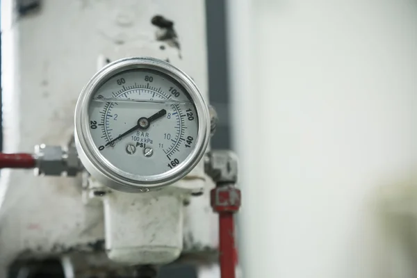 Pressure gauge in oil and gas production process for monitor condition, The gauge for measure in industry job, Industry background and close up gauge. — Stock Photo, Image