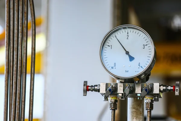 Pressure gauge in oil and gas production process for monitor condition, The gauge for measure in industry job, Industry background and close up gauge. — Stock Photo, Image